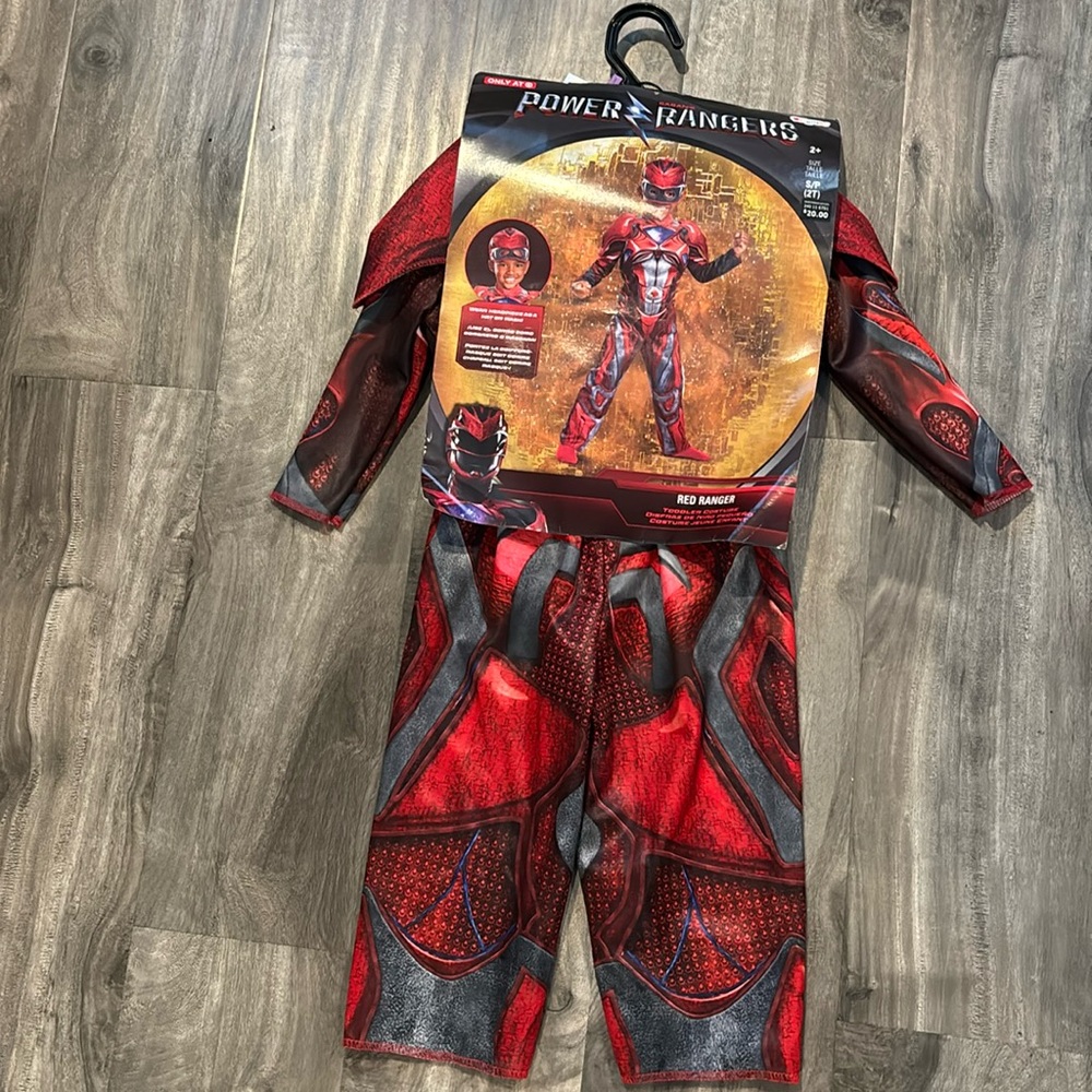 NWT, kids Red Power Rangers outfit. In it's original packaging. Kids Small (2T)